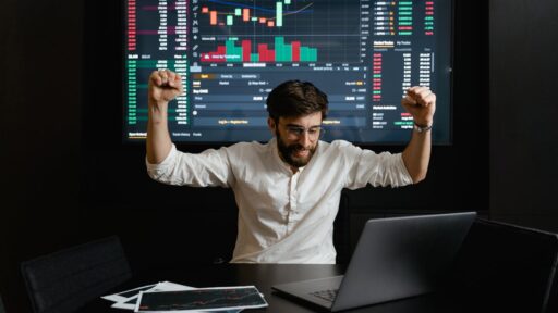 Traders analyzing market data using Bollinger Bands for volatility assessment